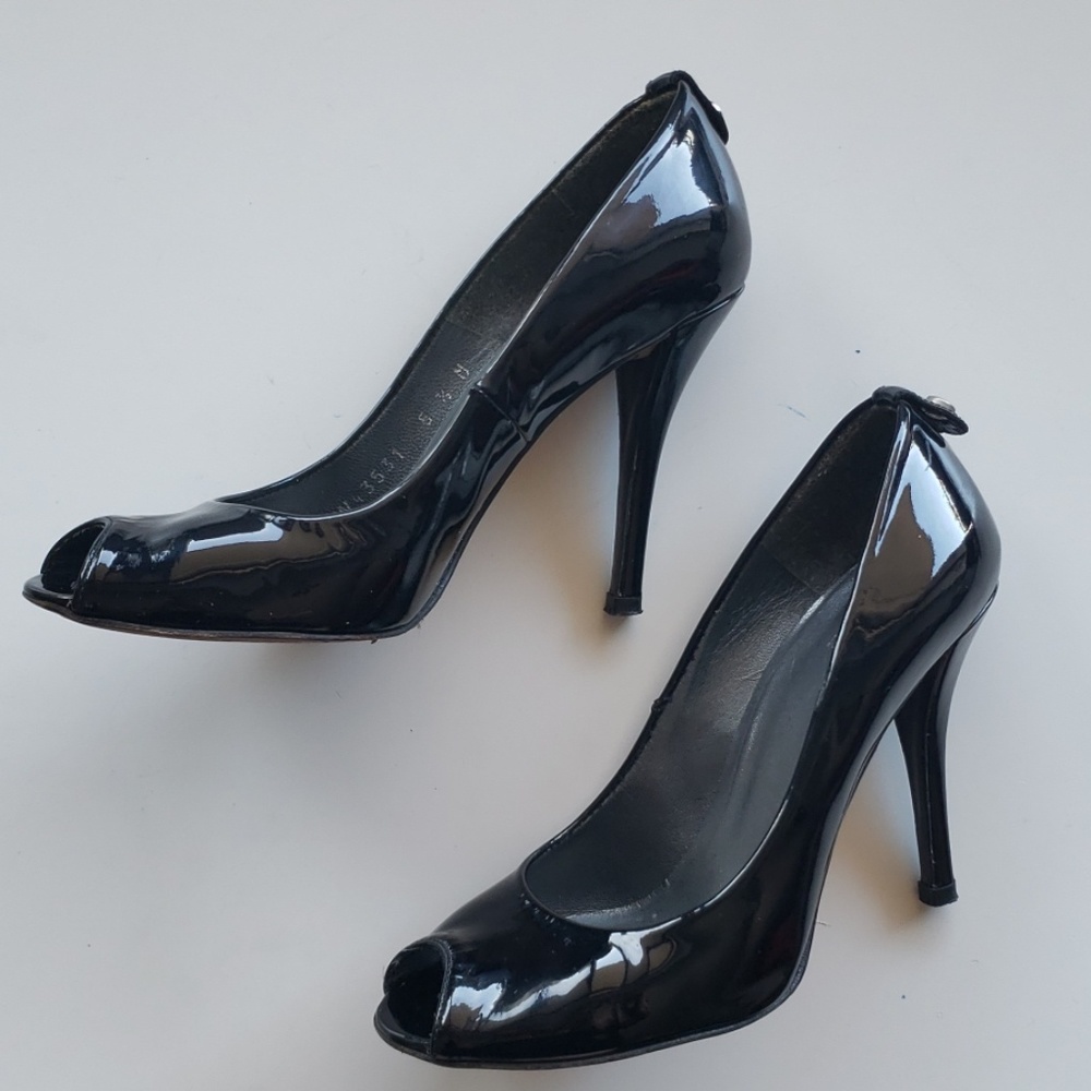 Stuart Weitzman patent leather peep toe pumps